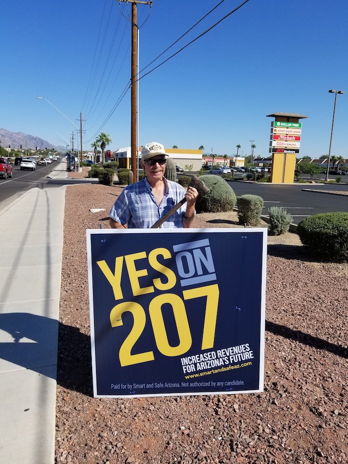 Holding prop 207 poster in Arizona
