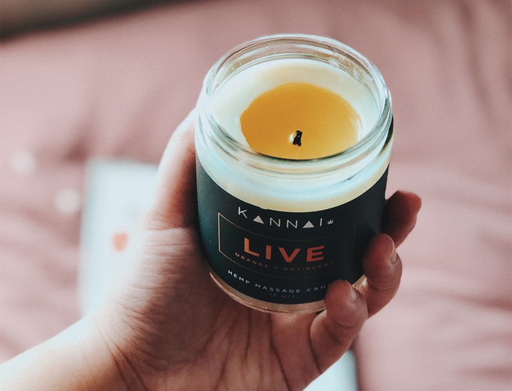 Holding a CBD candle