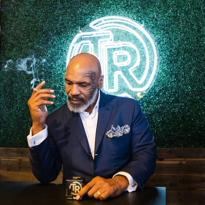 Mike Tyson with Tyson Ranch cannabis products