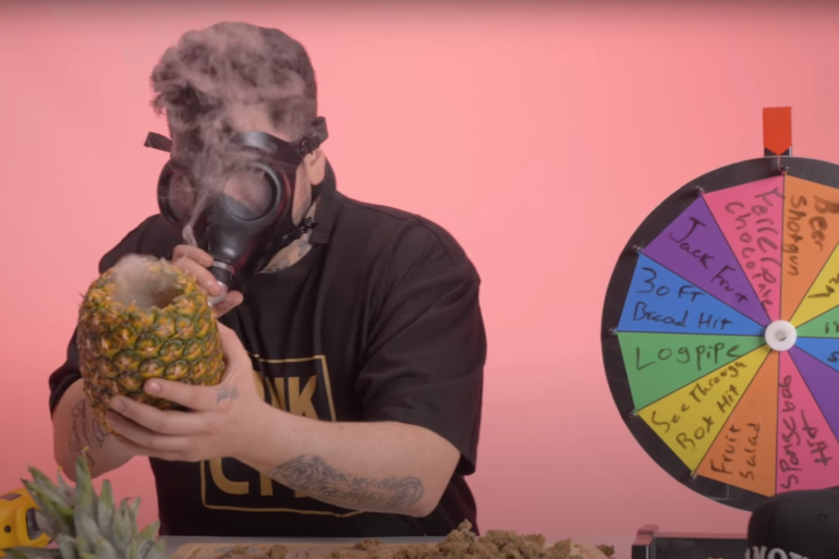 Suntownkid smoking weed out of pineapple
