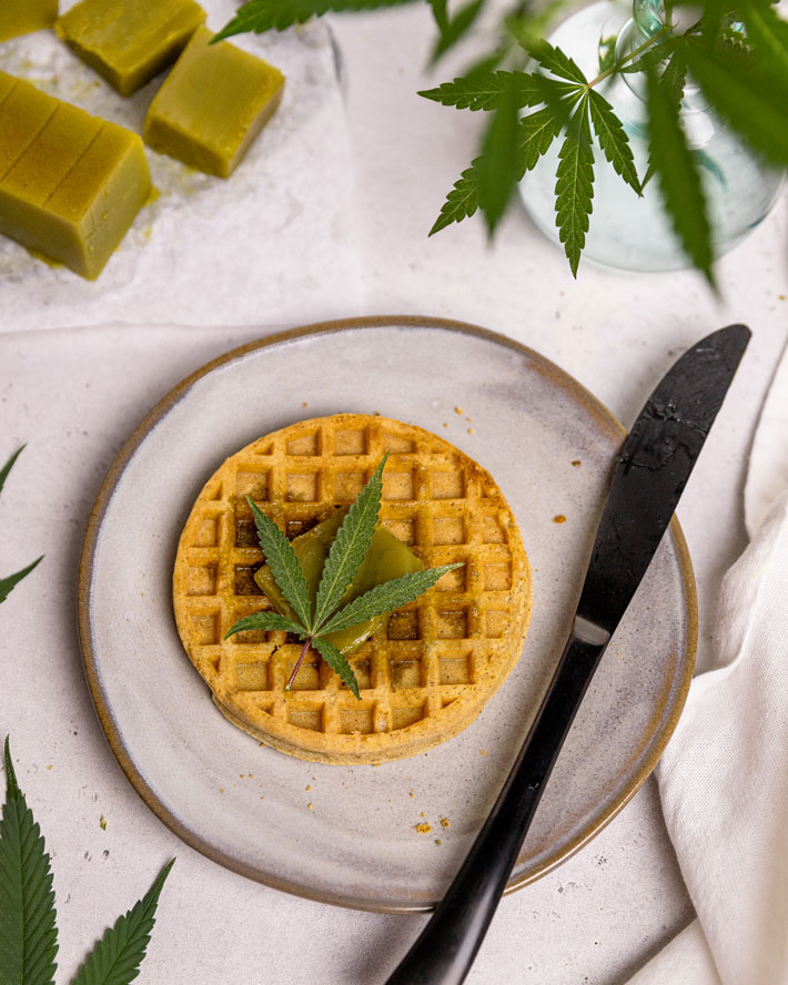 Adding cannabutter to waffle for breakfast