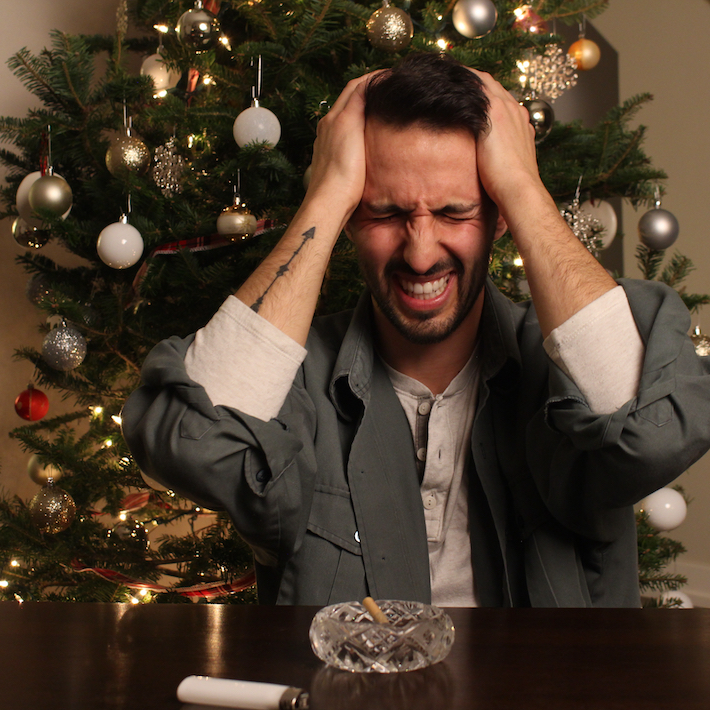 Man feeling stressed during the holidays