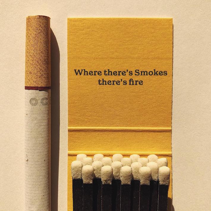 CBD cigarette next to matches