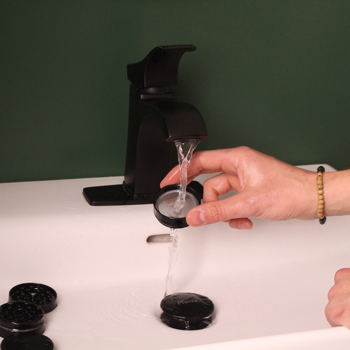 Rinse your weed grinder with water for a final clean