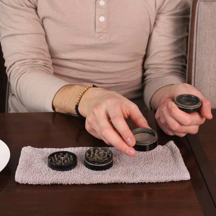 Disassemble your grinder to thoroughly clean it