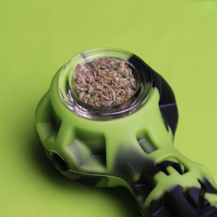 Eyce Spoon pipe glass bowl packed with cannabis flower