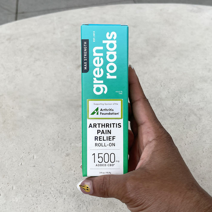 Reviewer testing pain relief topical from Green Roads