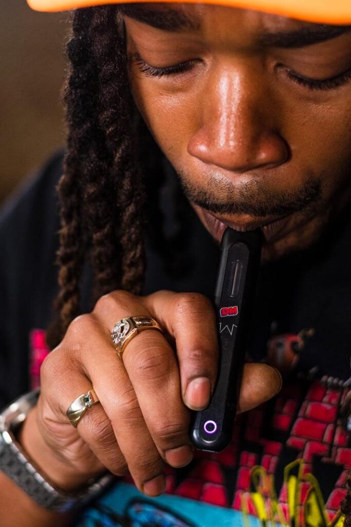 Vaper using a delta-8 disposable device to get high