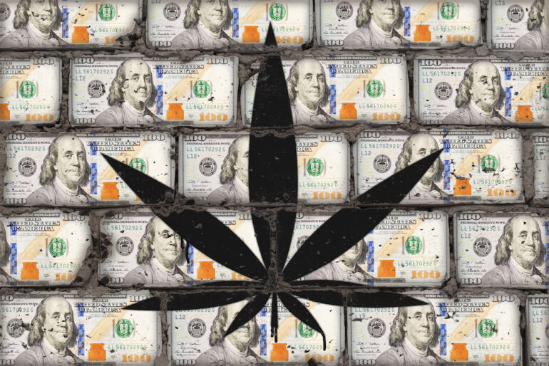 US dollar bills and cannabis leaf
