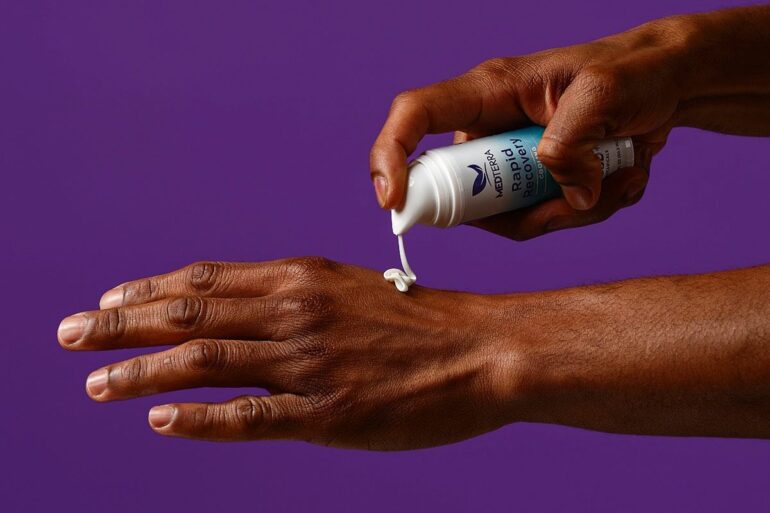 Using CBD cream on hand for pain relief