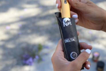 Consumer using a delta-8 THC vape pen in Texas