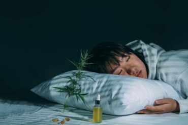 Girl sleeping in bedroom after taking CBD oil with CBDA