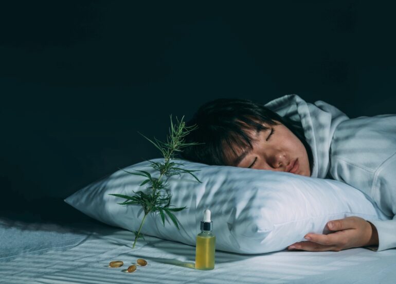 Girl sleeping in bedroom after taking CBD oil with CBDA